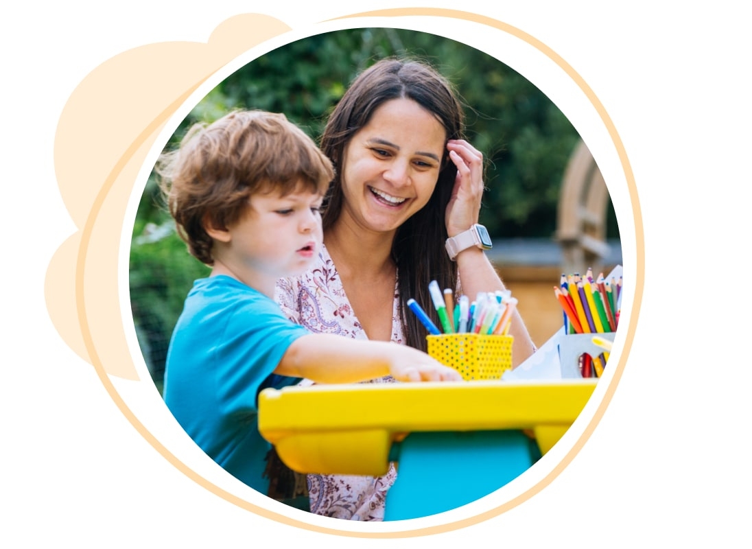 Childminder playing with a child